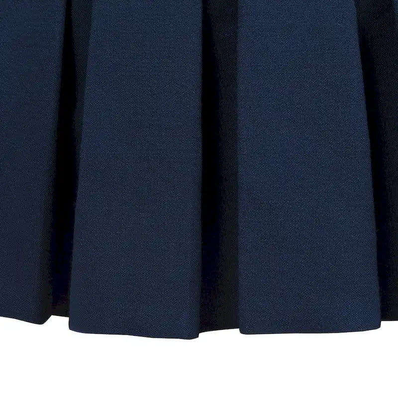 Pouf de cocktail capitonné avec jupe plissée